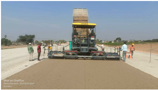 WMM top layer laying under progress at Ch. 213+500