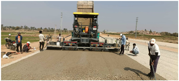 Laying of WMM Top layer 