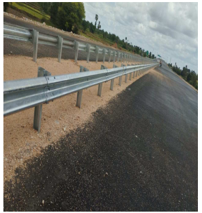 Metal Beam Crash Barrier Erection Work in Progress at Ch. 203+100 